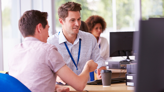 Student speaking to his advisor