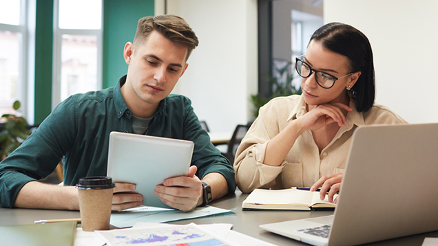 Students working together in an office