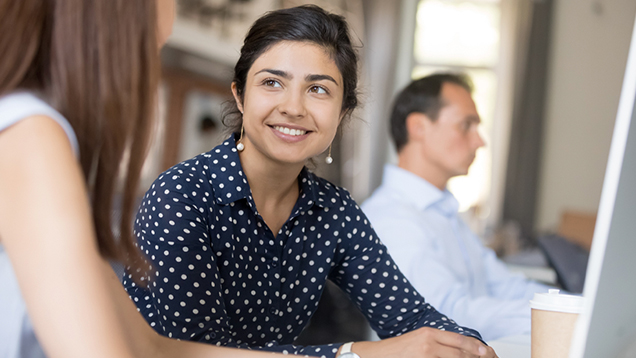 Woman listening to her colleague