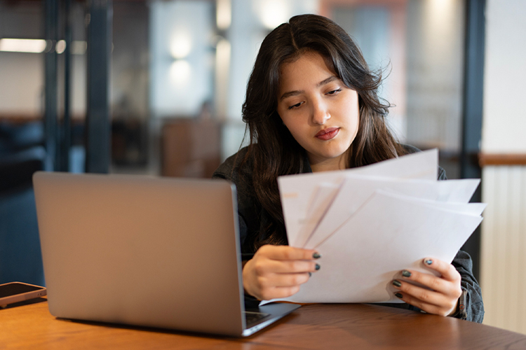 Student looking at documents