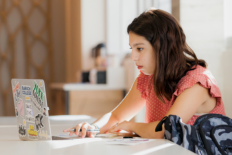 Student using her laptop