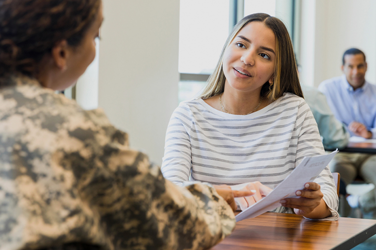 Veteran speaking to her advisor