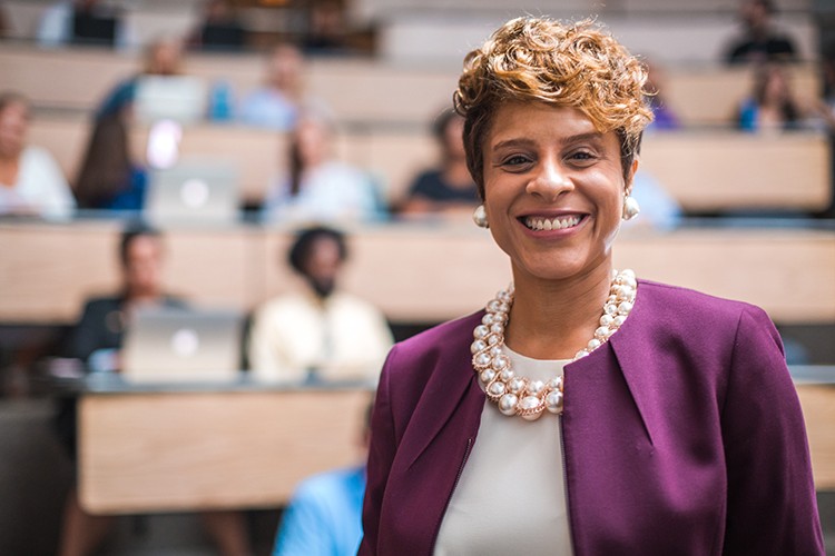 Professor in front of a classroom.