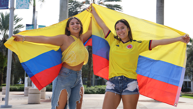 NSU students holding Colombian flags