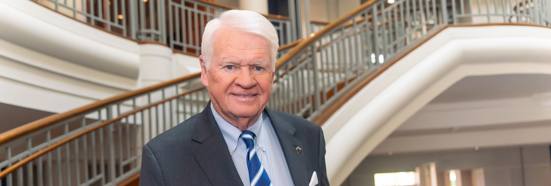 Dr. Moon headshots with stairs behind