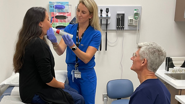 Proessor teaching at NSU ALS Clinic