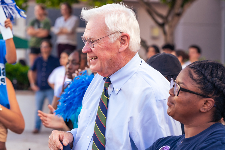 Homecoming parade president Moon smiling