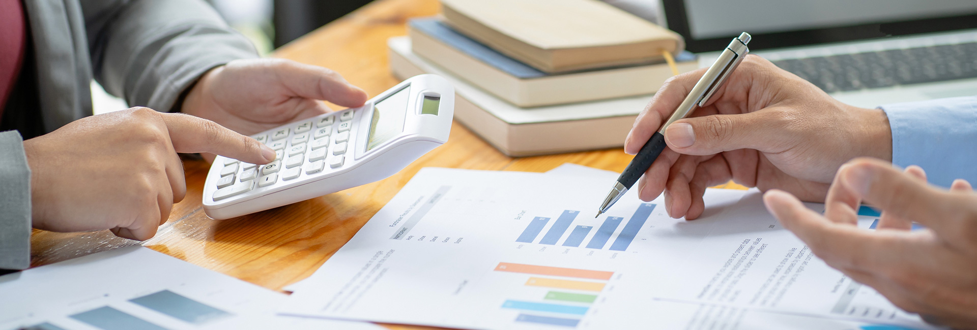 Business team reviewing documents close up