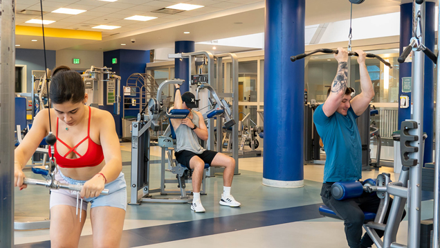Rec-Plex center students weight training