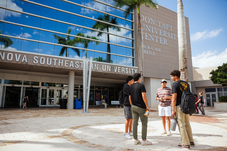 Students speaking outside campus