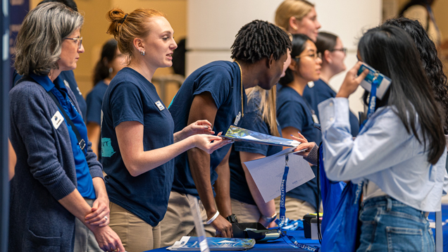 NSU people at event giving academic support