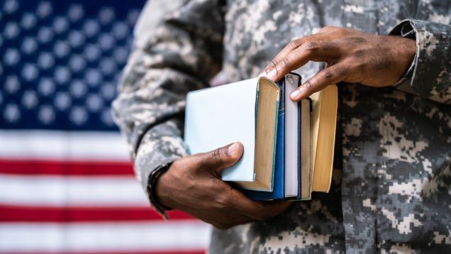 holding books